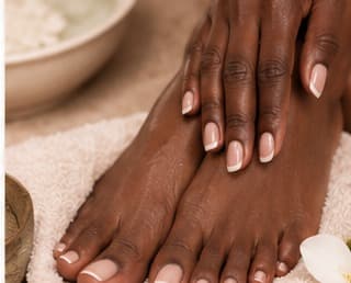 Manicure and pedicure treatment at Timeless Glo